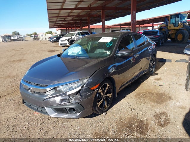 2018 HONDA CIVIC TOURING VIN: JHMFC1F91JX034078