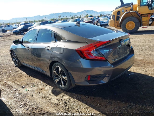 2018 HONDA CIVIC TOURING VIN: JHMFC1F91JX034078