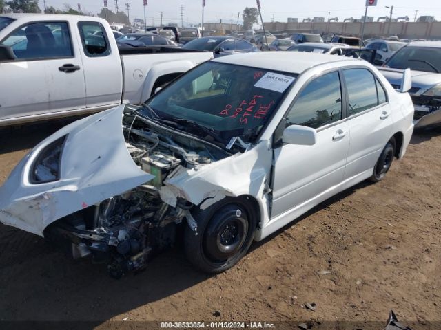 2006 MITSUBISHI LANCER EVOLUTION JA3AH86C56U032813 Photo 1