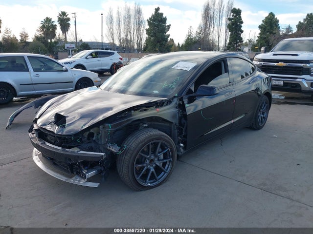 Tesla Model 3 Standard Range Plus Rear-wheel Drive 2021 5YJ3E1EA7MF878084 Image 2