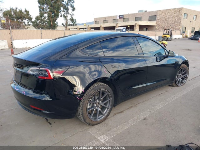 Tesla Model 3 Standard Range Plus Rear-wheel Drive 2021 5YJ3E1EA7MF878084 Image 4