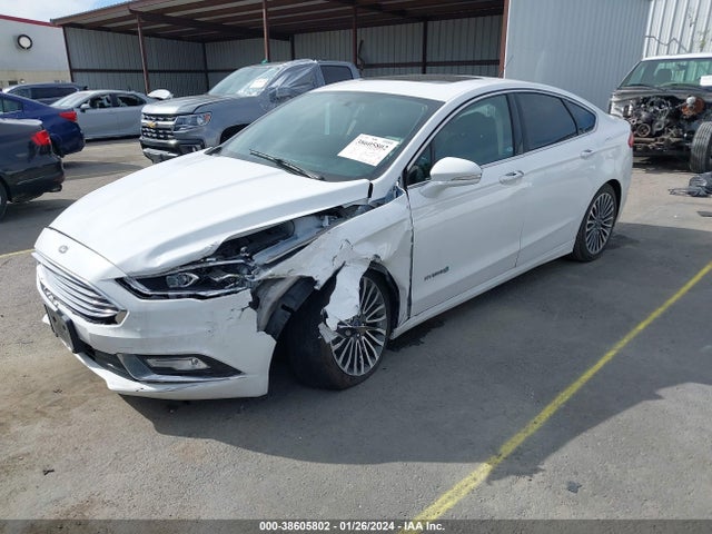 2018 FORD FUSION HYBRID TITANIUM VIN: 3FA6P0RU3JR124668