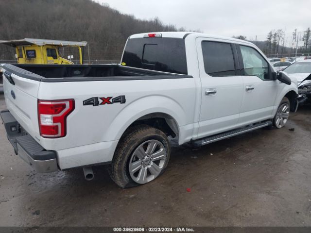 1FTEW1E4XKFD50581 Ford F-150 Xlt