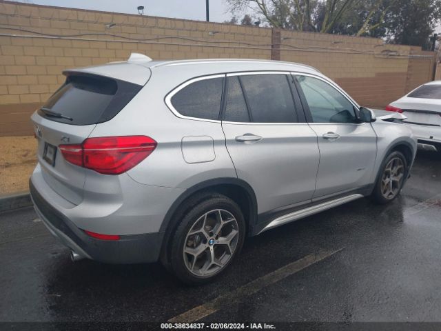 WBXHT3C30G5E56312 BMW X1 Xdrive28i