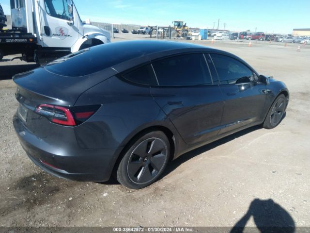 Tesla Model 3 Standard Range Plus Rear-wheel Drive 2021 5YJ3E1EA6MF992450 Image 4