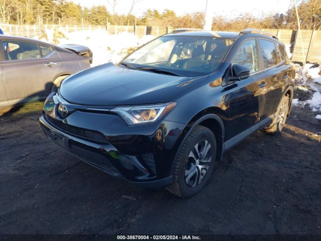 2T3BFREV4JW831014 Toyota RAV4 LE