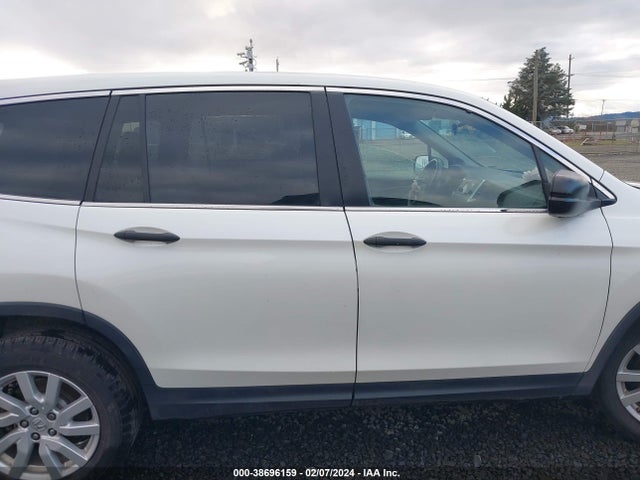 Honda PILOT LX 2019 5FNYF6H16KB060466 Image 13