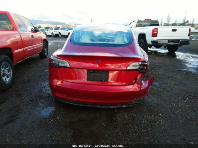 5YJ3E1EA7MF989704 Tesla Model 3 Standard Range Plus Rear-wheel Drive