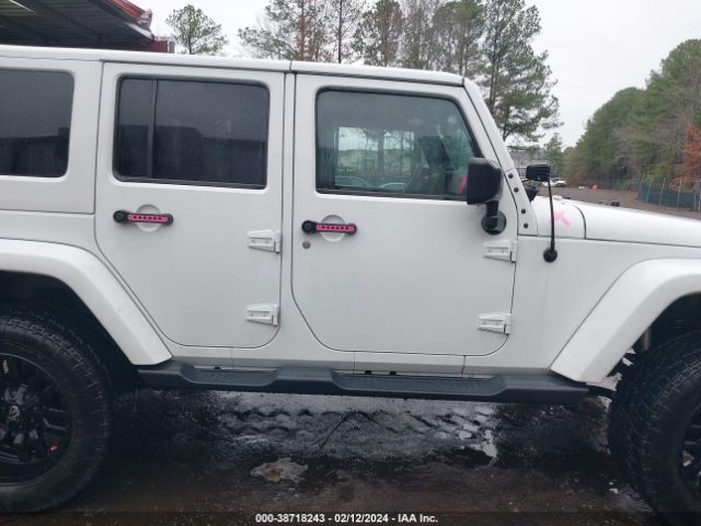 1C4HJWEG2EL303635 Jeep Wrangler Unlimited Sahara
