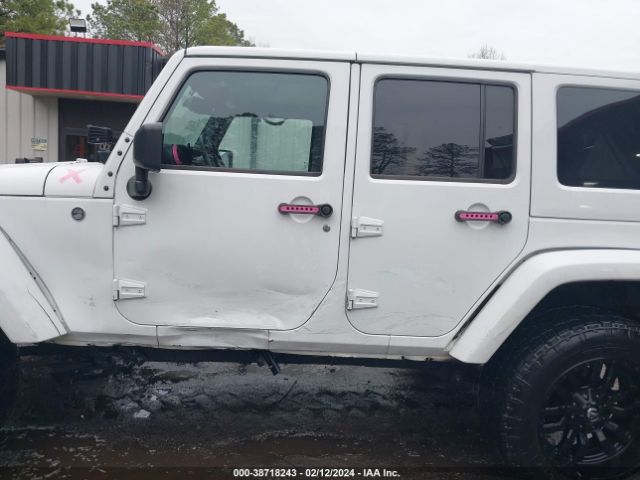 1C4HJWEG2EL303635 Jeep Wrangler Unlimited Sahara