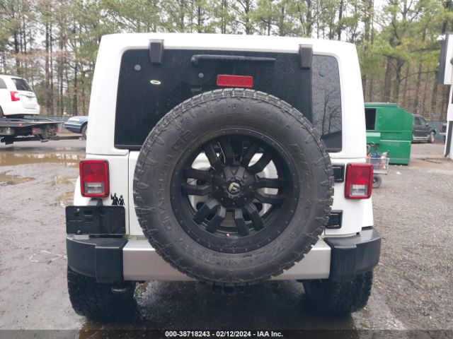 1C4HJWEG2EL303635 Jeep Wrangler Unlimited Sahara