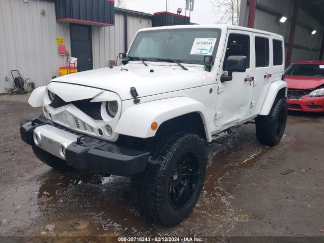 1C4HJWEG2EL303635 Jeep Wrangler Unlimited Sahara