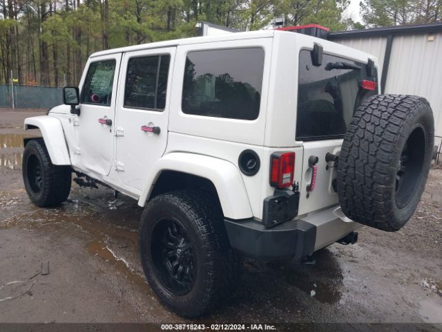 1C4HJWEG2EL303635 Jeep Wrangler Unlimited Sahara