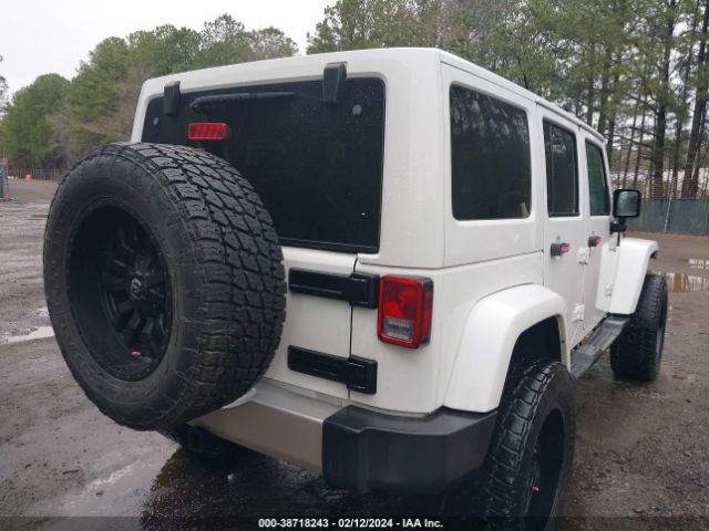 1C4HJWEG2EL303635 Jeep Wrangler Unlimited Sahara