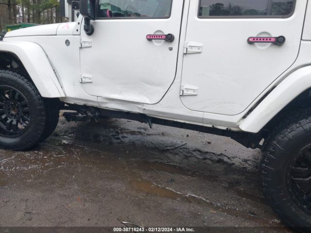 1C4HJWEG2EL303635 Jeep Wrangler Unlimited Sahara