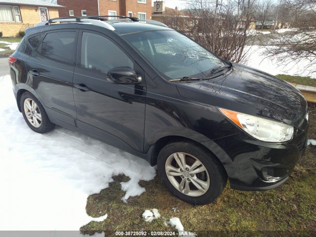 2011 HYUNDAI TUCSON GLS/LIMITED VIN: KM8JUCAC7BU242410