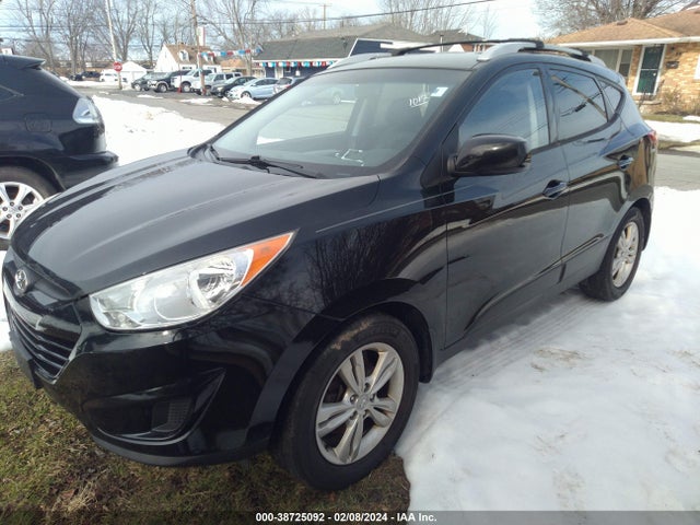 2011 HYUNDAI TUCSON GLS/LIMITED VIN: KM8JUCAC7BU242410