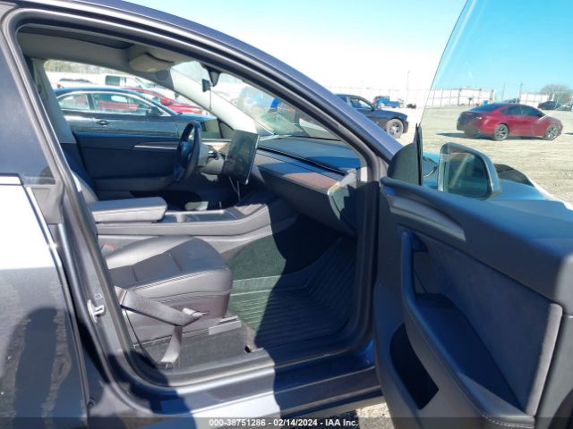 2023 TESLA MODEL Y 7SAYGDEF2PF696734 Photo 4