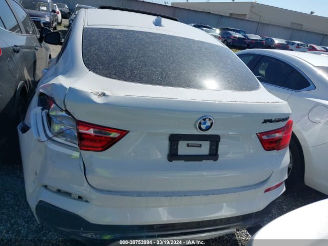 5UXXW7C58J0W65354 BMW X4 M40i