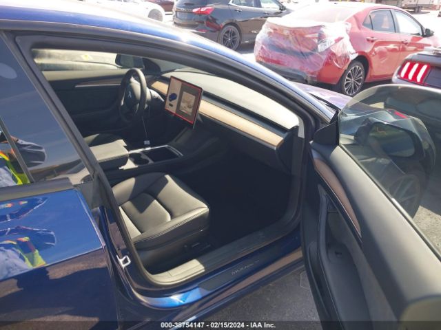 2023 TESLA MODEL 3 5YJ3E1EA2PF640051 Photo 4