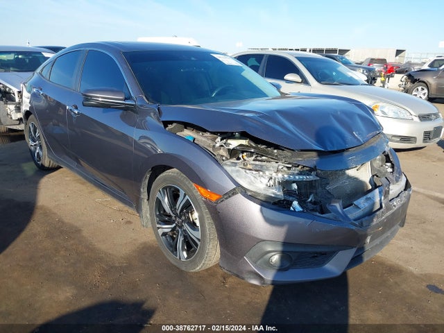 2017 HONDA CIVIC TOURING VIN: 19XFC1F90HE032530