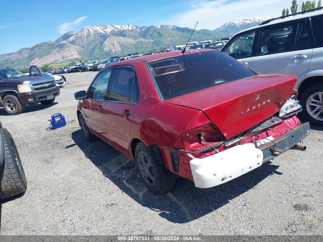 2002 MITSUBISHI LANCER JA3AJ26E72U050565 Photo 2