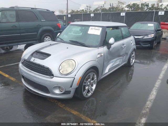 2009 MINI COOPER S WMWMF73549TW83667 Photo 1