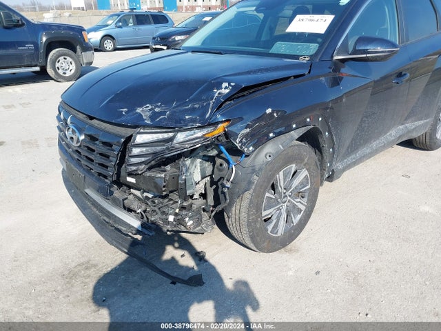 KM8JBCA19NU072463 Hyundai Tucson Hybrid Blue