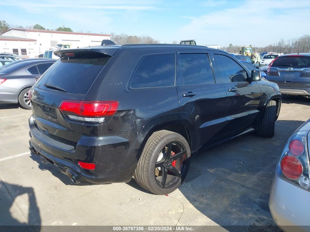Auction sale of the 2014 Jeep Grand Cherokee Srt, vin: 1C4RJFDJ1EC390137, lot number: 38797356