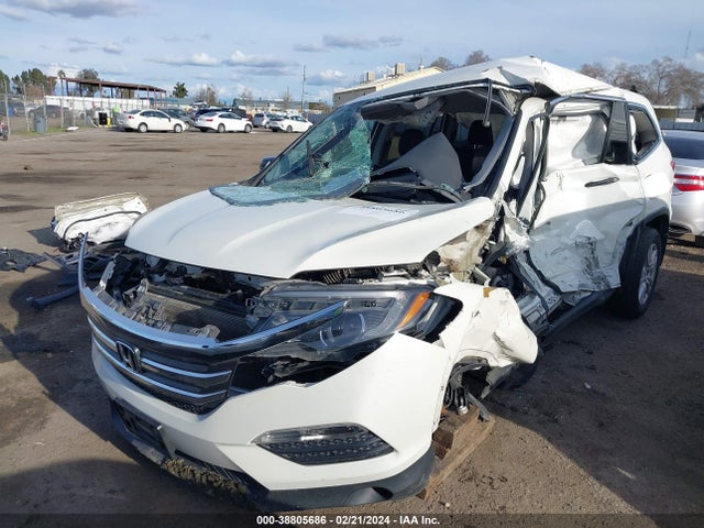 Honda PILOT LX 2018 5FNYF5H10JB013829 Image 2