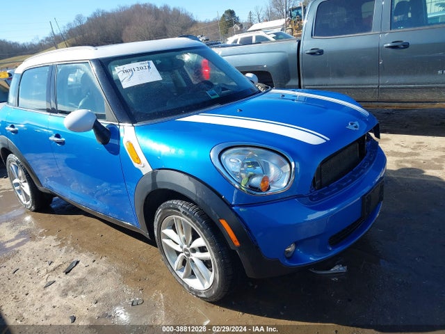 2011 MINI COOPER COUNTRYMAN WMWZB3C5XBWM29086 Photo 0