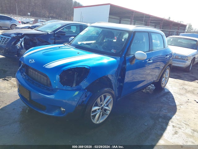 2011 MINI COOPER COUNTRYMAN WMWZB3C5XBWM29086 Photo 1