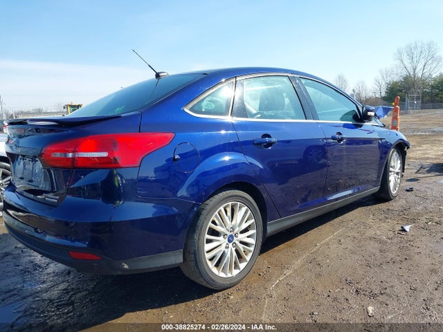 2016 FORD FOCUS TITANIUM VIN: 1FADP3J26GL261954