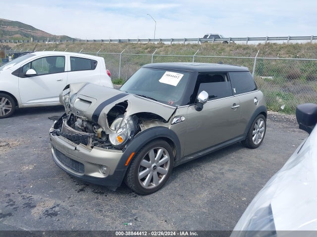 2009 MINI COOPER S WMWMF73539TW85670 Photo 1