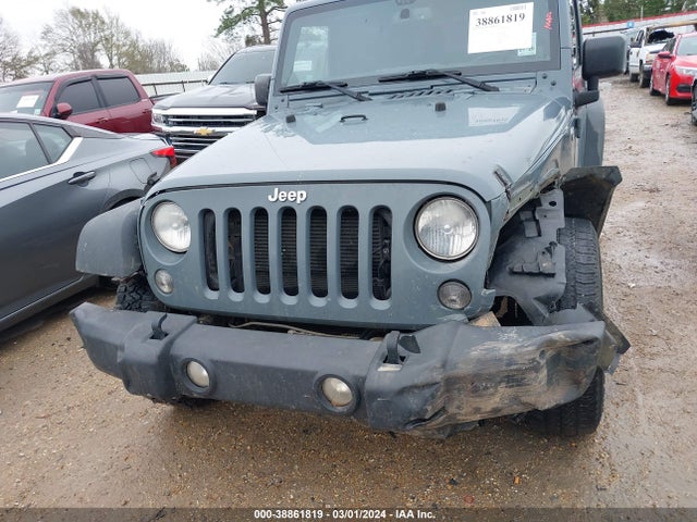 1C4AJWAG4EL305457 Jeep Wrangler Sport