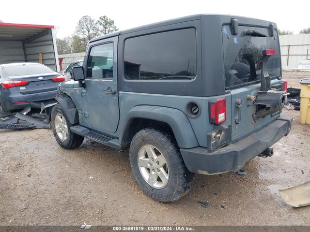 1C4AJWAG4EL305457 Jeep Wrangler Sport