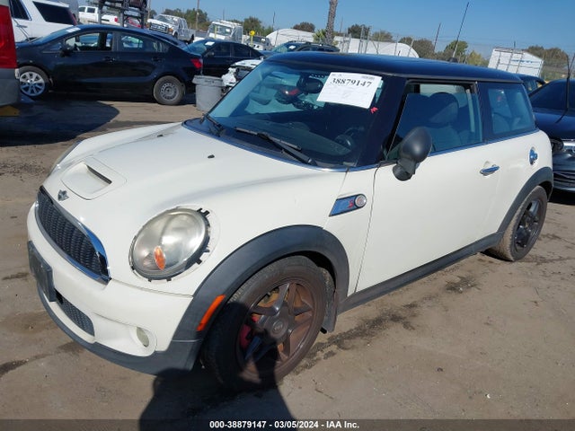 2009 MINI COOPER S WMWMF73589TW84272 Photo 1