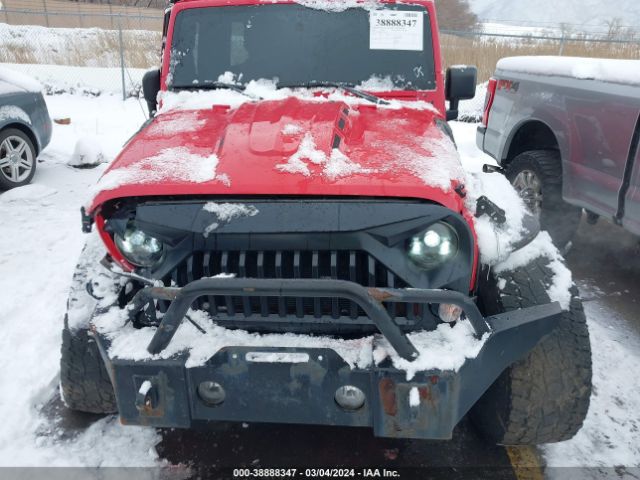 1C4BJWDG9EL102516 Jeep Wrangler Unlimited Sport