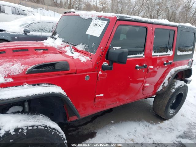 1C4BJWDG9EL102516 Jeep Wrangler Unlimited Sport