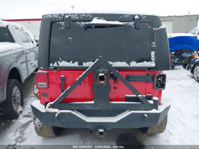 1C4BJWDG9EL102516 Jeep Wrangler Unlimited Sport