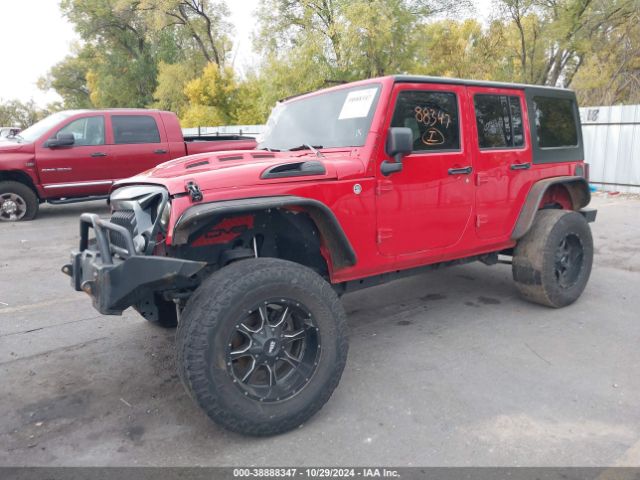 1C4BJWDG9EL102516 Jeep Wrangler Unlimited Sport