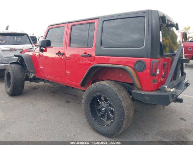 1C4BJWDG9EL102516 Jeep Wrangler Unlimited Sport