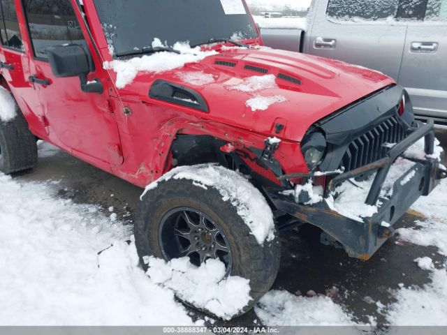 1C4BJWDG9EL102516 Jeep Wrangler Unlimited Sport