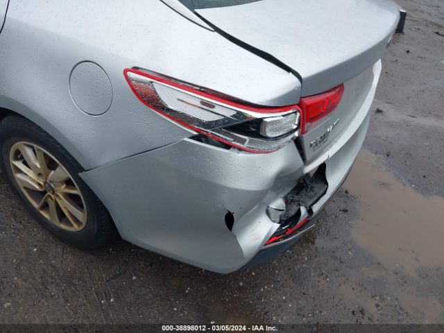 5XXGT4L35GG084876 KIA Optima Lx
