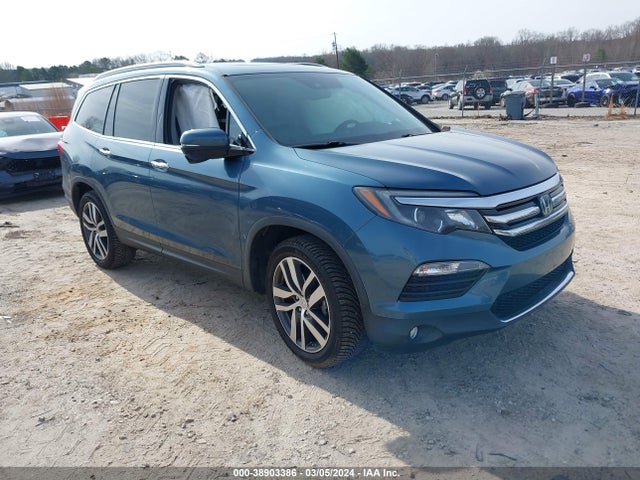 Honda Pilot Touring 2016 5FNYF5H96GB023747 головне зображення