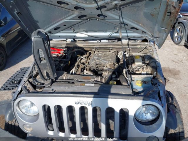 1C4HJWDG2GL113550 Jeep Wrangler Unlimited Sport