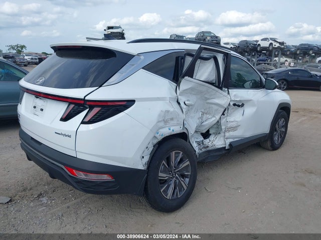 KM8JBCA10NU039822 Hyundai Tucson Hybrid Blue