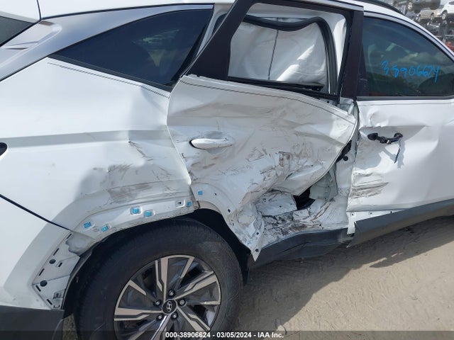 KM8JBCA10NU039822 Hyundai Tucson Hybrid Blue