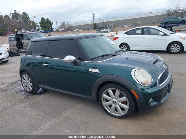 2009 MINI COOPER S WMWMF735X9TT95863 Photo 0