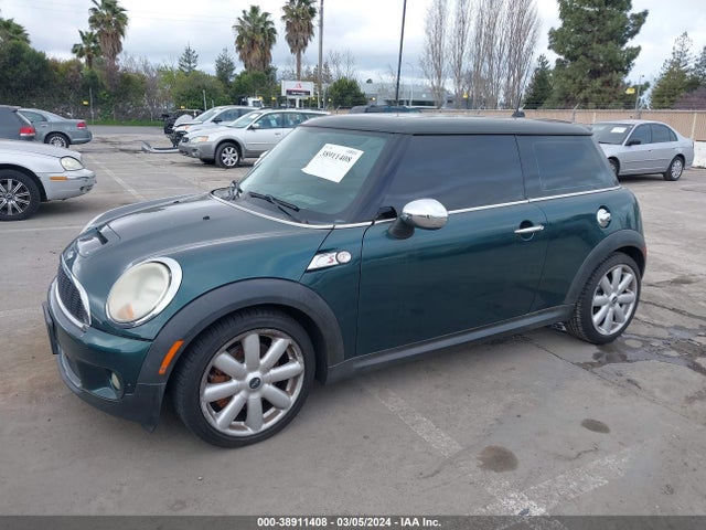 2009 MINI COOPER S WMWMF735X9TT95863 Photo 1